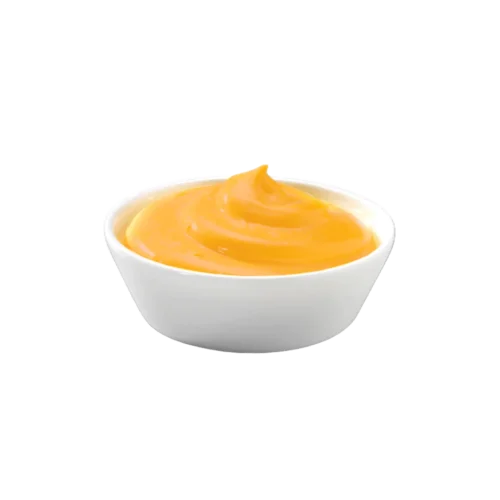 kremasti cheddar sir sos u bijeloj posudi